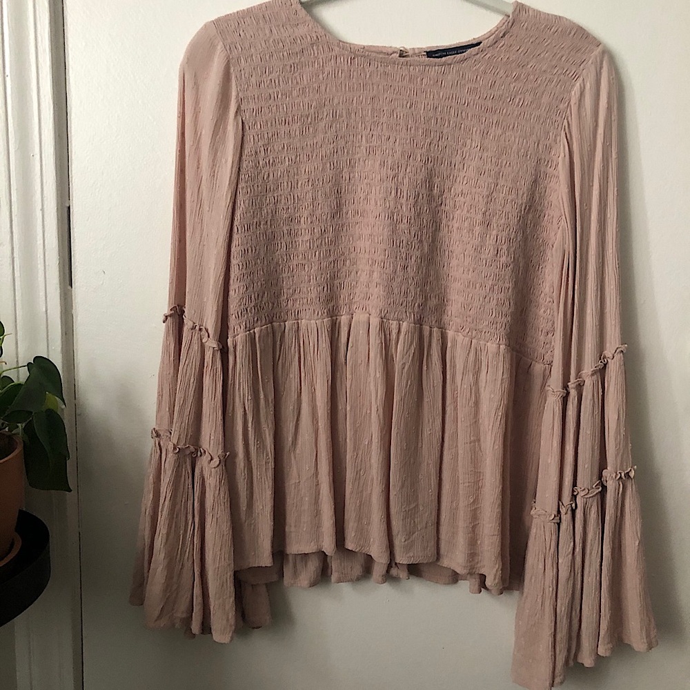 pastel pink blouse